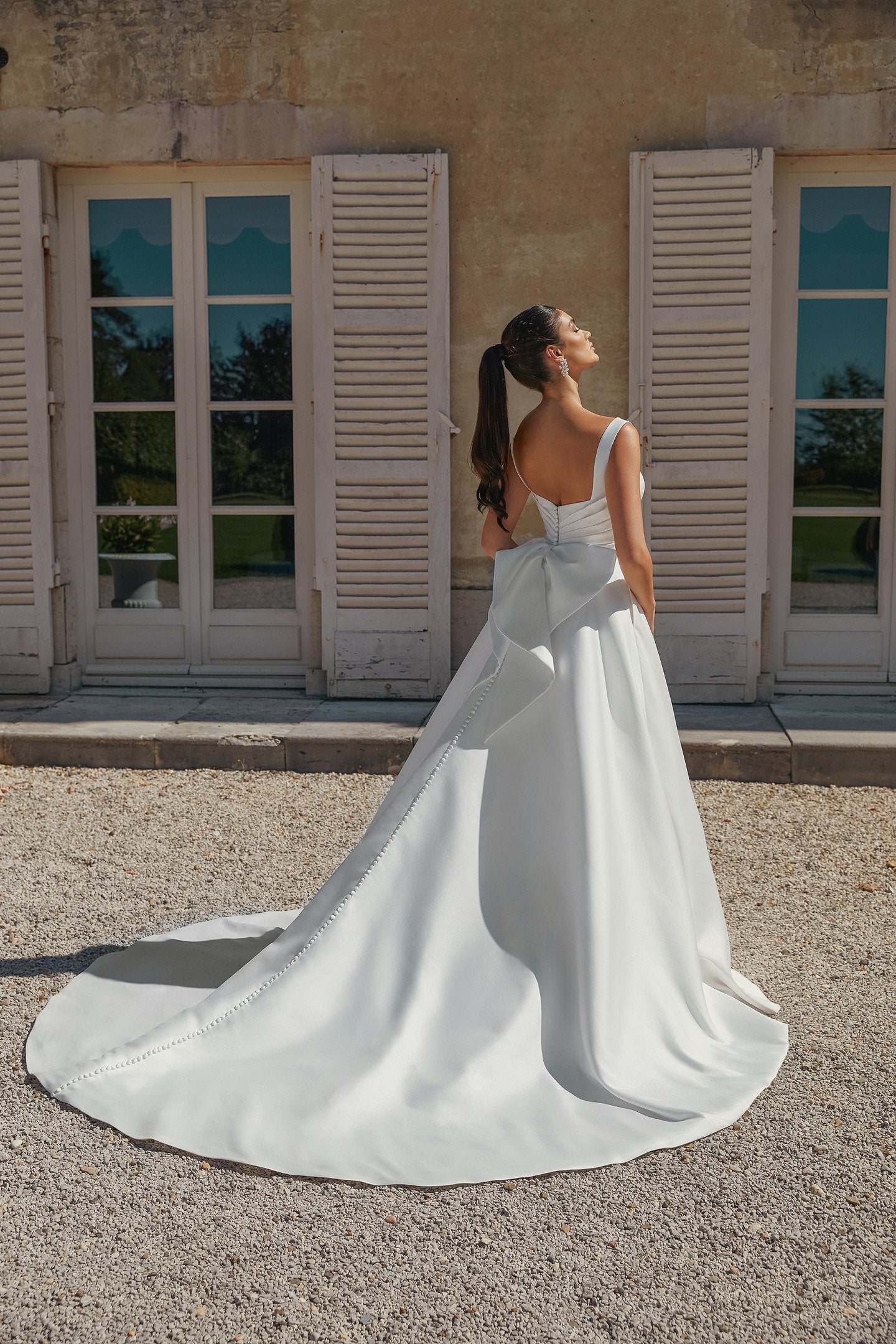 Mikado A-Line Bridal Gown with Pleated Bodice and Detachable Bow