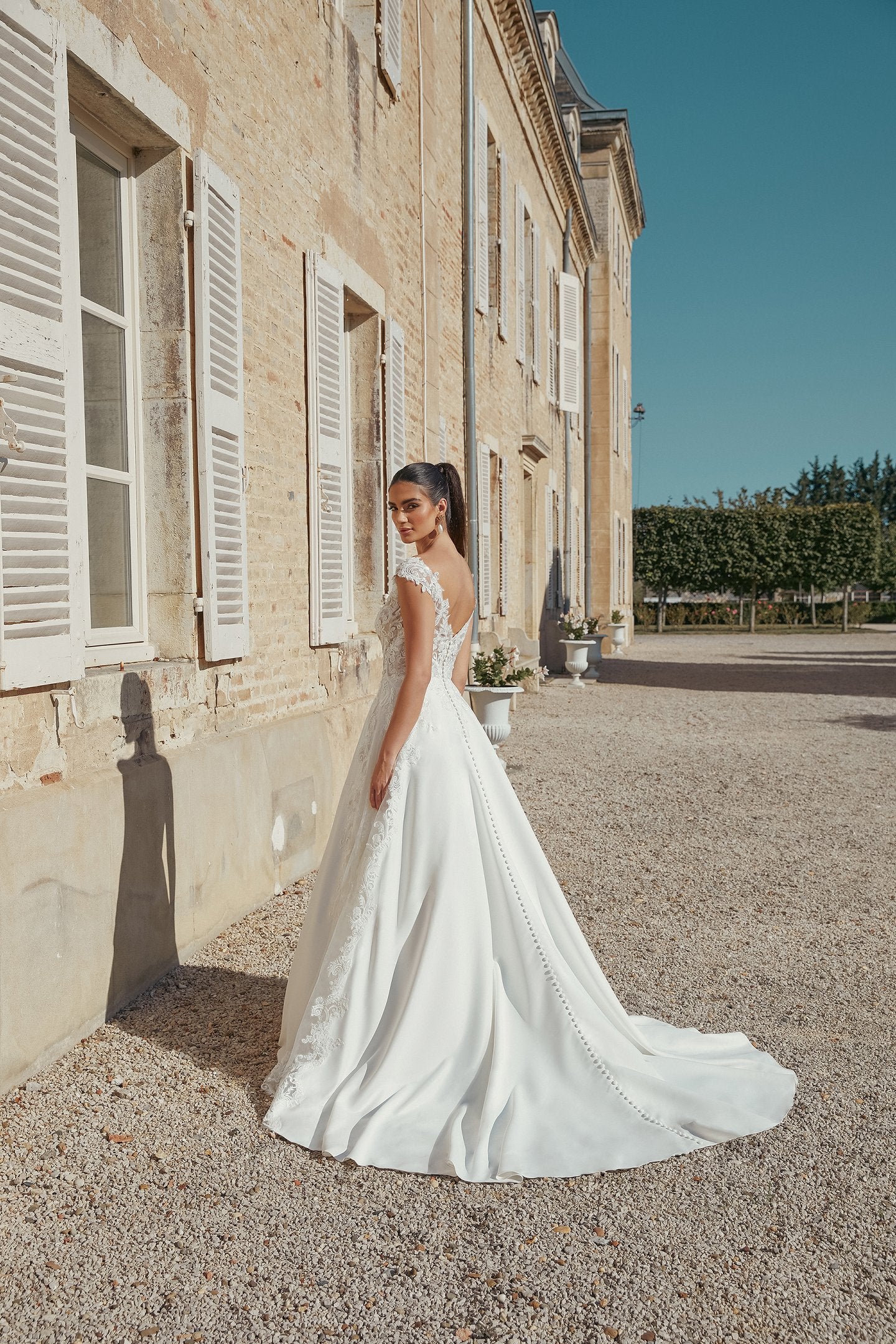 Satin A-Line Bridal Gown with Modest V-Neckline and Cap Sleeves
