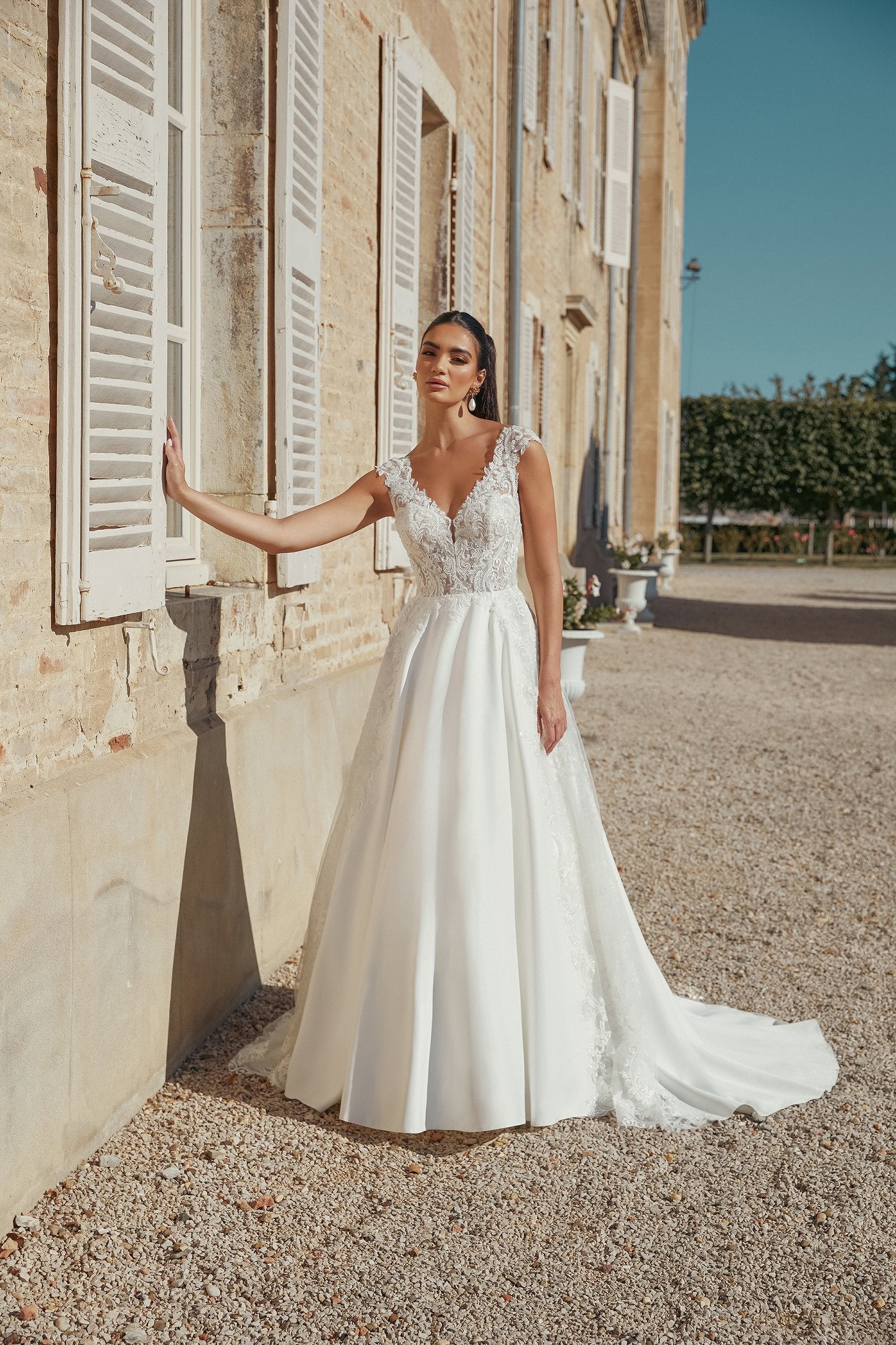 Satin A-Line Bridal Gown with Modest V-Neckline and Cap Sleeves