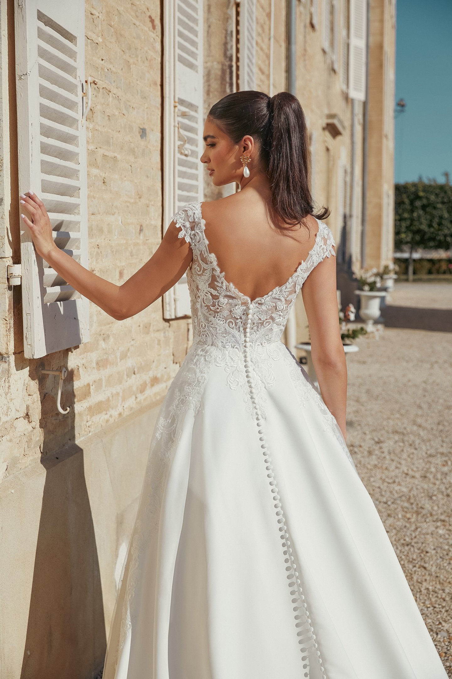 Satin A-Line Bridal Gown with Modest V-Neckline and Cap Sleeves